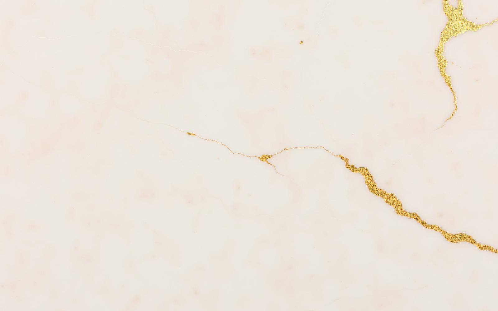 Cream marble surface with fine champagne veining